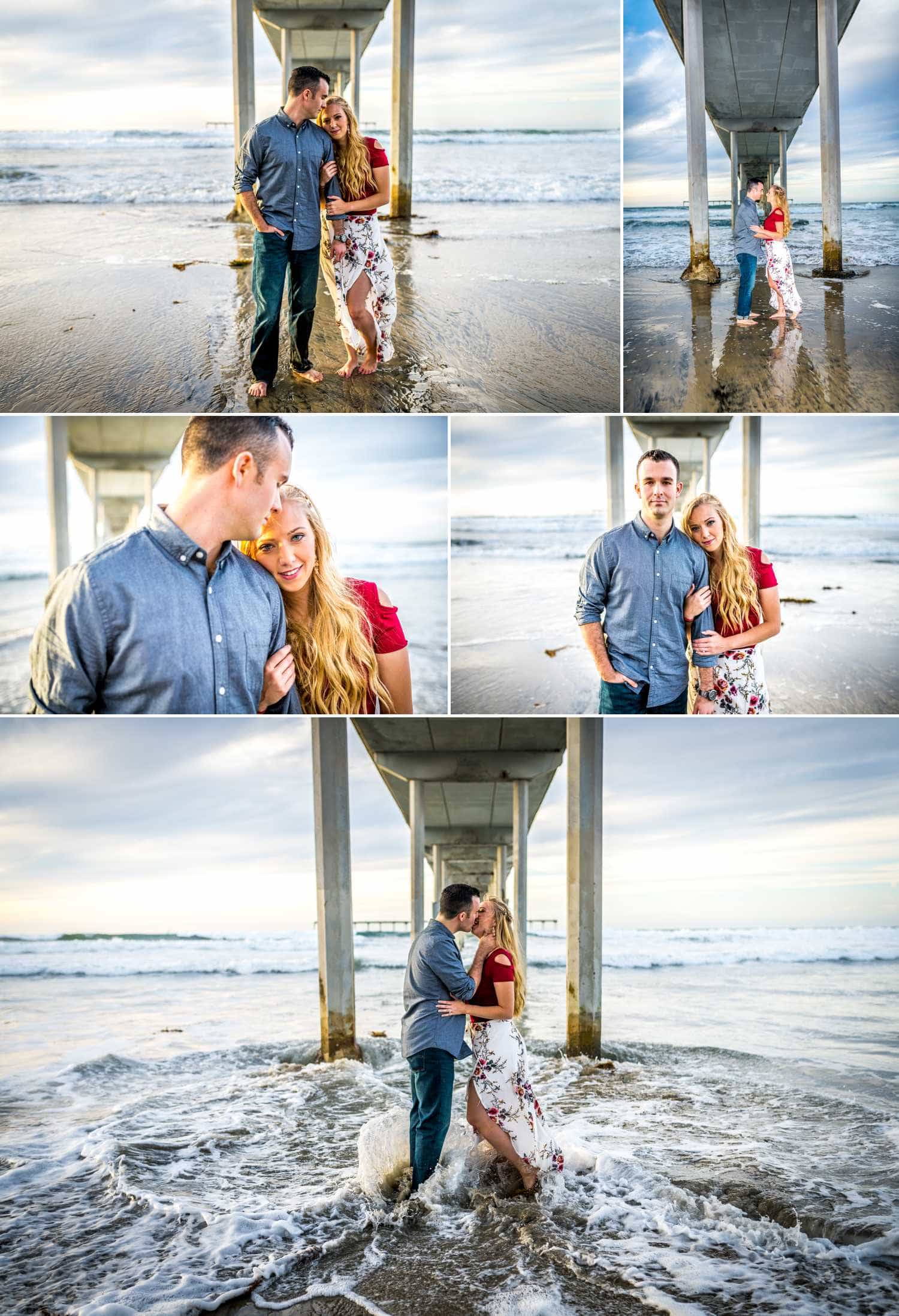 Engagement session under a pier at the beach.
