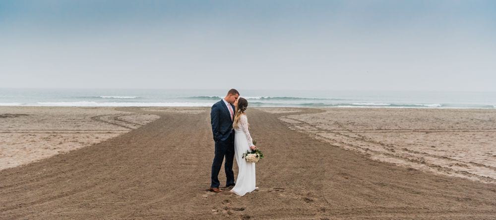 Photo of couple just married on the beach in Oceanside California