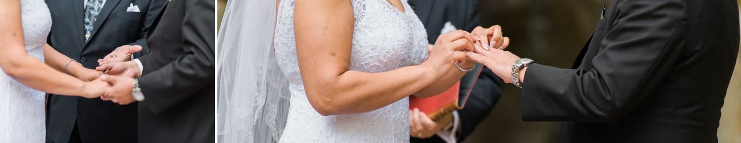Bride placing wedding ring on grooms finger